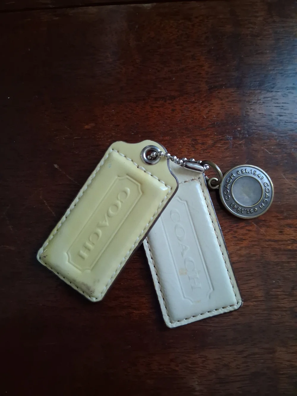 Coach Double Leather Tag Keychain in Cream and Pale Yellow